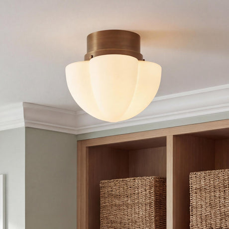 Lorna Small Flush Mount 11", Vintage Bronze and Opal Glass scalloped flush mount in a Transitional Closet with woven baskets.
