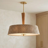 Pascal Extra Large Pendant 30", Jute, Rattan and Aged Brass woven Pendant in a Coastal Dining Room with light oak cabinets.