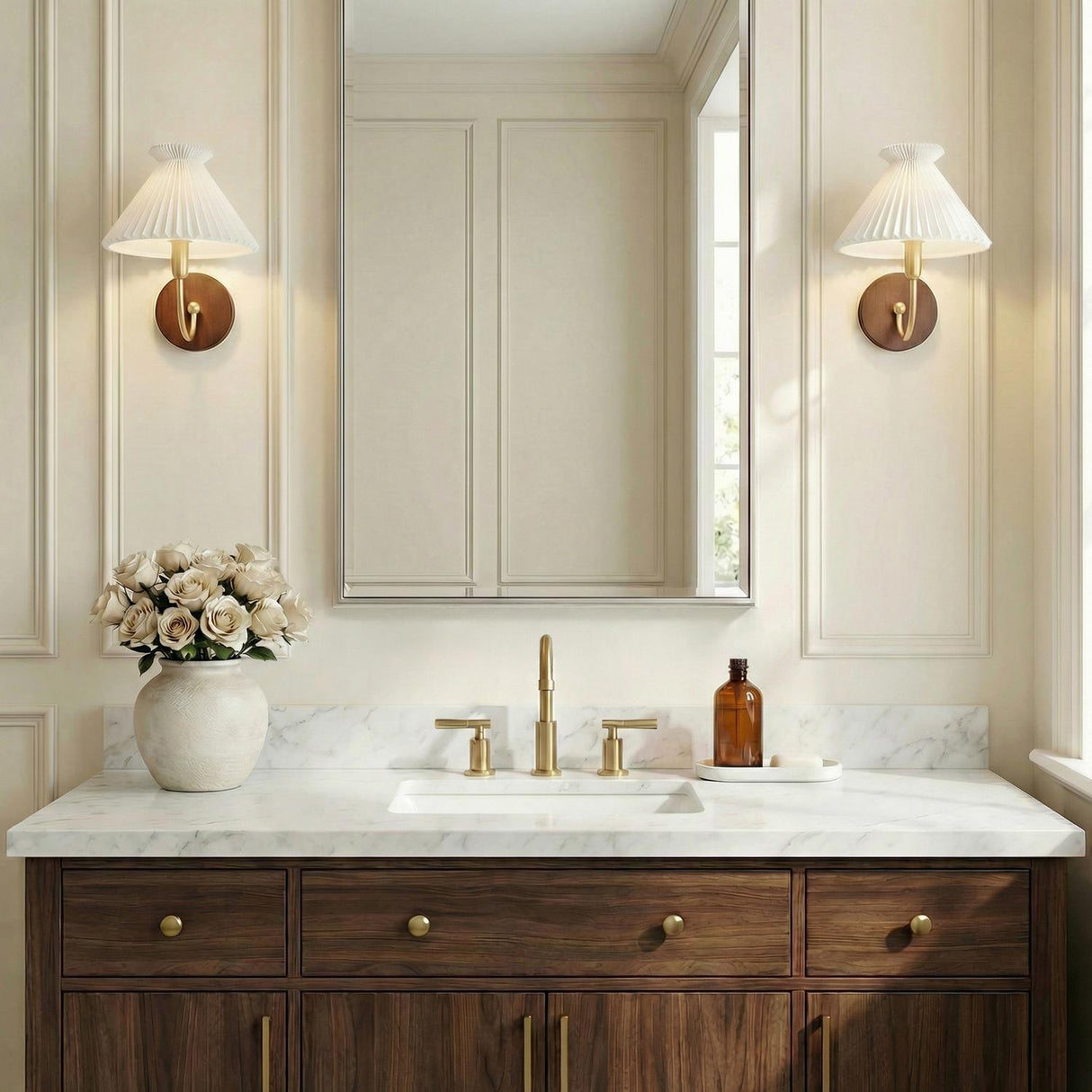 Marie Wall Sconce 10", Aged Brass and Wood scalloped Wall Sconce in a Transitional Bathroom with a marble vanity and wood cabinets.