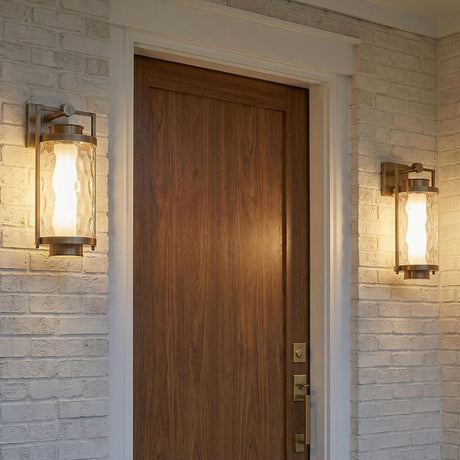 Catalina LED Outdoor Wall Light, Medium 17", Patina Brass geometric Outdoor Wall in a Modern Farmhouse Outdoor with a white brick wall.