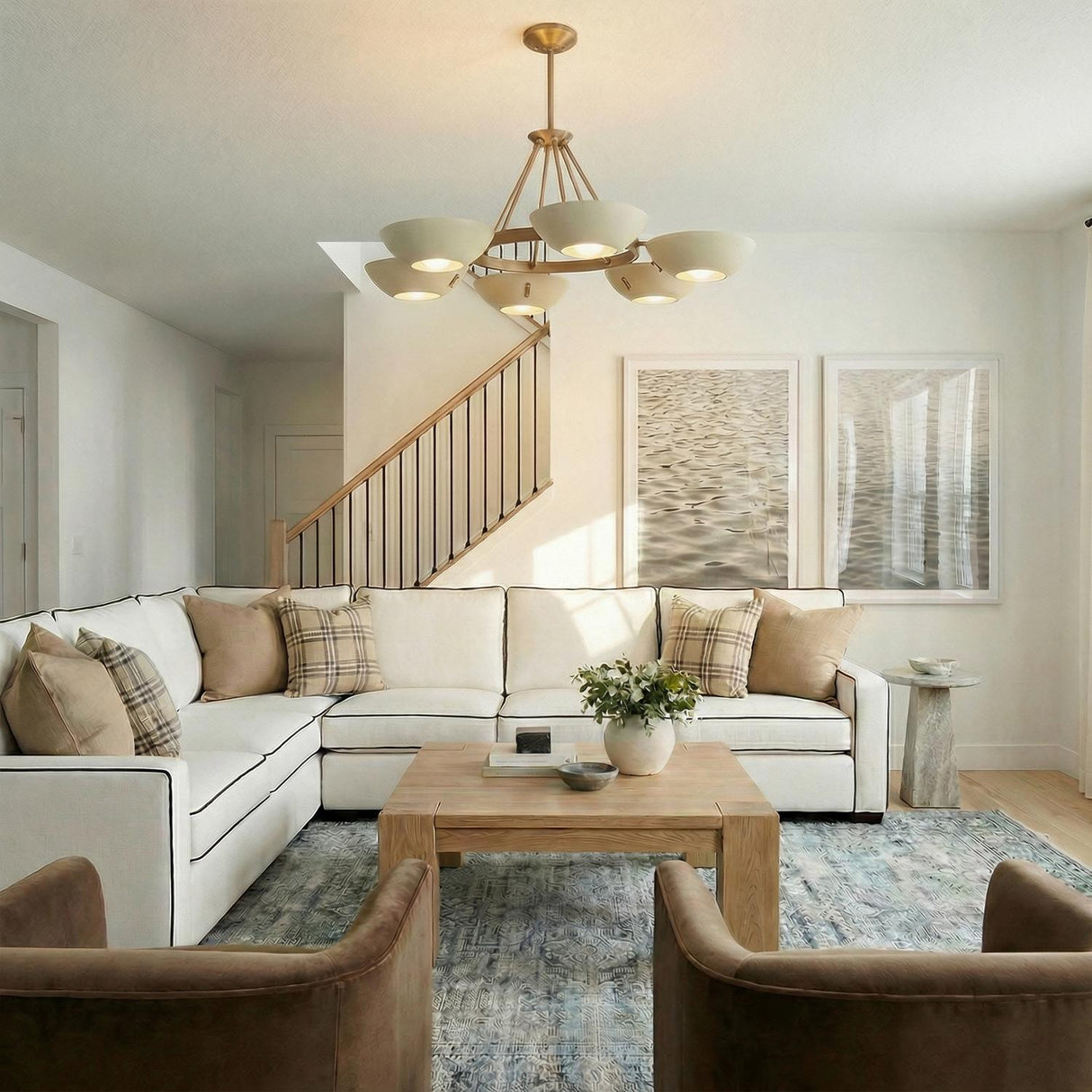 Clovis 6 Light Chandelier 40", Soft Sand and Patina Brass geometric Chandelier in a Transitional Living Room with a white sectional.