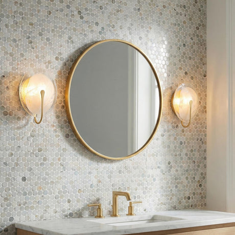 Whitman Wall Sconce 12", Gold Leaf and Art Glass Gold globe Wall Sconce in a Contemporary Bathroom with a marble vanity and penny tile.