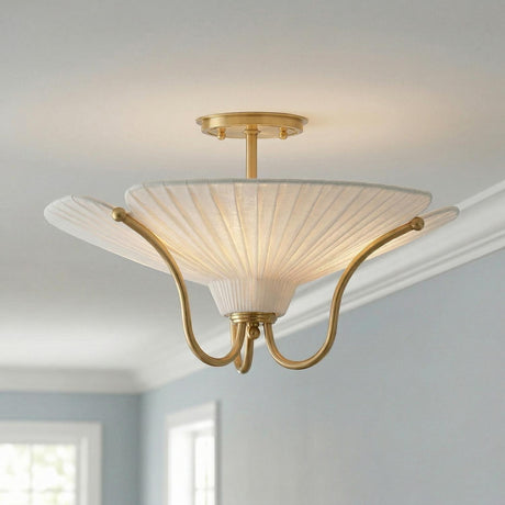 Marcelle Semi-Flush 18", Aged Brass and Linen Aged Brass scalloped Flush Mount in a Transitional Bedroom with white crown molding.