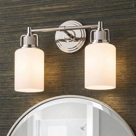 Claxton 2 Light Vanity 14", Polished Nickel geometric vanity in a Contemporary Bathroom with textured grasscloth wallpaper and a round mirror.