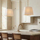 Bellara Large Pendant 20", Gilded Brass geometric Pendant in a Modern Farmhouse Kitchen with a white marble island.