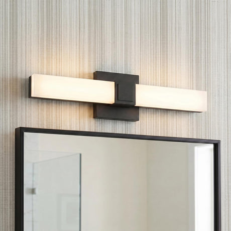 A contemporary bathroom featuring a matte black and frosted glass vanity bar installed above a matching black-framed mirror against gray textured wallpaper.