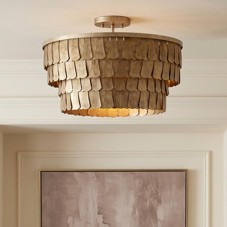 A transitional foyer featuring the Barina Semi-Flush in distressed brushed brass along the ceiling above a neutral abstract painting and creamy white paneled walls.