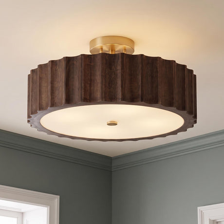 A transitional foyer with a matte brass and espresso wood semi-flush mount installed along the ceiling center between grey walls and white decorative door trim.
