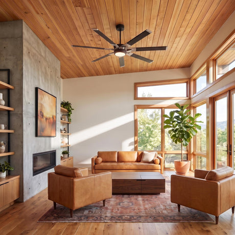 A mid-century living room with the Loon LED Ceiling Fan 62", Matte Black with Brushed Steel along a wood ceiling above tan leather chairs and a concrete fireplace.