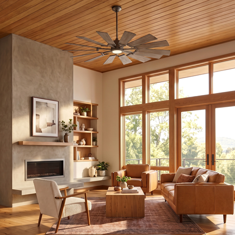 A modern farmhouse living room with a Dunlin LED Ceiling Fan in gray wash wood and aged pewter centered on a wood-paneled ceiling near a concrete fireplace.