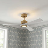 A contemporary bedroom featuring the Oriole LED Ceiling Fan 52", Modern Brass and Matte White on a standard ceiling above blue patterned wallpaper and two windows.