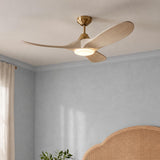 A transitional bedroom with an Egret LED Ceiling Fan in whitewash oak and modern brass installed at the ceiling center above a cane headboard.