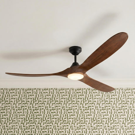 A contemporary living room featuring the Egret LED Ceiling Fan 70", Walnut Wood and Matte Black mounted to a white ceiling above green and white patterned wallpaper.