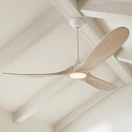 A modern farmhouse living room with an Egret LED Ceiling Fan 60" in matte white and white oak mounted to a sloped beamed ceiling.