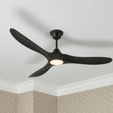 A transitional bedroom featuring the Egret LED Ceiling Fan 70" with matte black oak blades and a glowing frosted glass light against patterned taupe wallpaper.