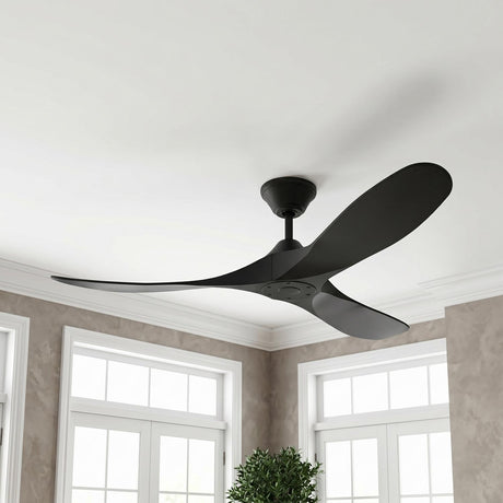 A contemporary porch featuring the Egret Outdoor Ceiling Fan 52" in matte black mounted on a white ceiling with beige stucco walls and potted boxwood.