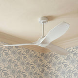 A traditional home exterior features a Heron Outdoor Smart Ceiling Fan 60", Matte White on a porch ceiling with floral wallpaper and decorative crown molding.