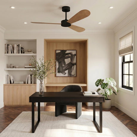 A modern office with the Willet Smart Ceiling Fan 52", Matte Black and Natural Oak centered above a dark wood desk and light wood built-in shelving.