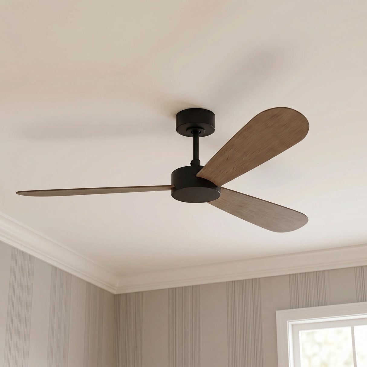 A transitional living room featuring the Willet Smart Ceiling Fan in matte black and natural oak mounted to the ceiling center against pinstriped wallpaper and crown molding.