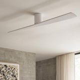A minimalist living room with the Finch Smart Ceiling Fan 72" in Matte White Oak along the ceiling center beside concrete walls and neutral curtains.
