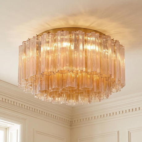 A traditional foyer with the Grace Flush Mount 22-inch, Brass with Topaz Glass installed on a standard ceiling with white dentil crown molding and decorative wall panels.