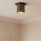 A transitional foyer with a Bevan Mini Cylinder Flush Mount 5", Bronze in a weathered bronze finish along the ceiling featuring textured beige patterned wallpaper.