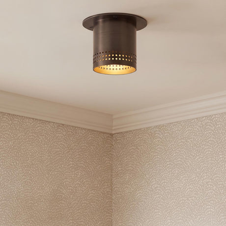 A transitional foyer with a Bevan Mini Cylinder Flush Mount 5", Bronze in a weathered bronze finish along the ceiling featuring textured beige patterned wallpaper.