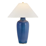 Danielle table lamp with a glossy ocean blue ceramic vase-shaped base and a white tapered fabric lampshade.