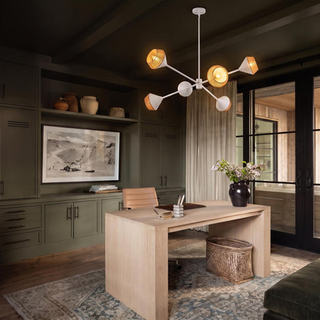 A contemporary office with the Sunita chandelier in matte white and rope suspended from a beamed ceiling above a desk and olive green built-in cabinets.