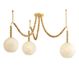 Wilhelmina 3 Light Swag Chandelier, Aged Brass, Oak, and Cloud Glass