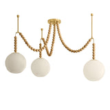 Wilhelmina 3 Light Swag Chandelier, Aged Brass, Oak, and Cloud Glass