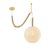 Wilhelmina Swag Pendant, Aged Brass, Oak, and Cloud Glass