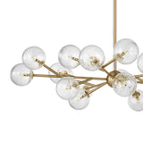 Zinnia Starburst 20-Globe Chandelier 32", Satin Brass and Clear Hammered Glass close up