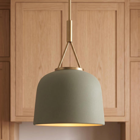 A transitional kitchen with the Stratford Small Pendant 12 inch in aged brass and thyme suspended along the ceiling before light oak shaker cabinets.