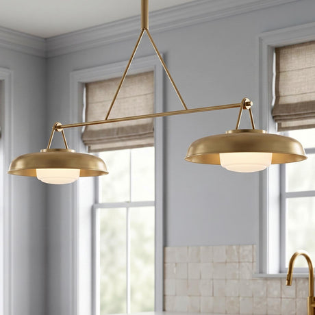 A transitional kitchen featuring the Stratford 2 Shade Linear Pendant 47", Aged Brass over a counter with a square tile backsplash and tan roman shades.
