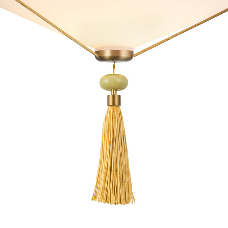 Beverly Semi-Flush 15", Brushed Brass and Opal Glass, close-up of the tassel, pale green bead, and brushed brass collar
