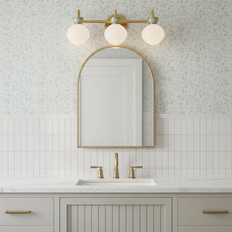 Piper 3 Light Vanity, Satin Brass and Aquaverde - Vanity light above a sink with mirror in a bathroom